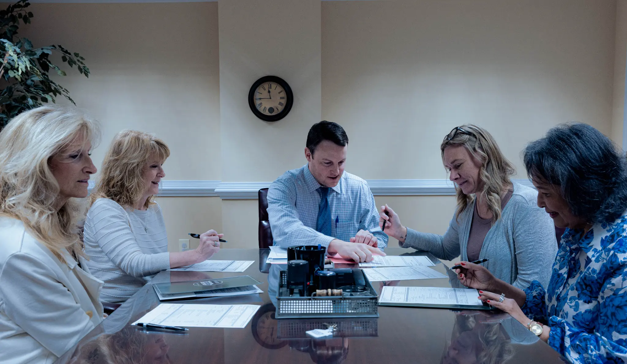Hardy Realty agents at the closing table